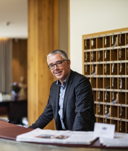 Reception manager Jürgen Winkelmann at the reception in the Hotel Jagdhaus Wiese in the Sauerland