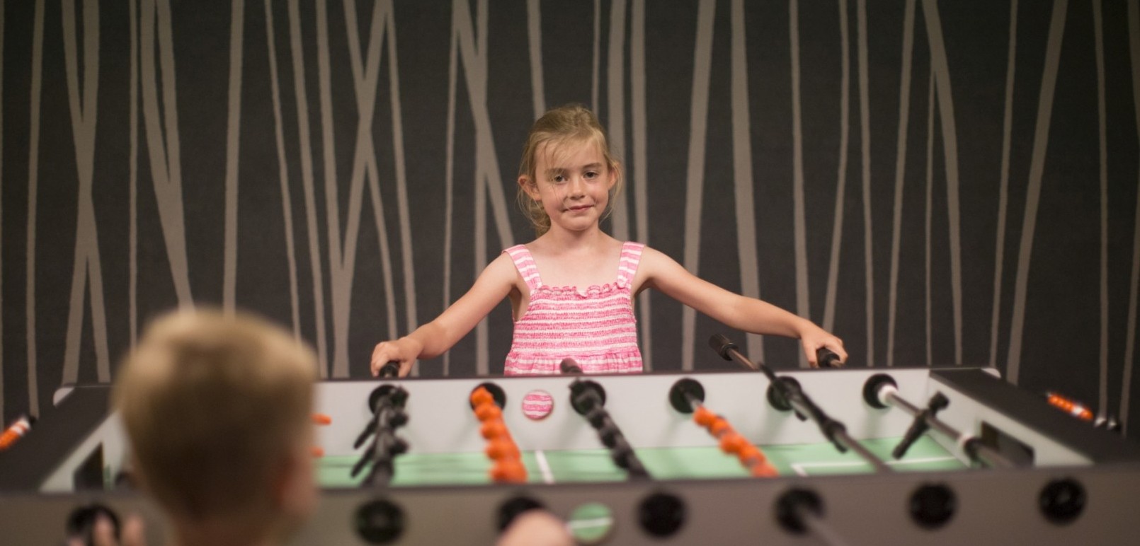 Families enjoy the table football table at the Jagdhaus Wiese family hotel in the Sauerland