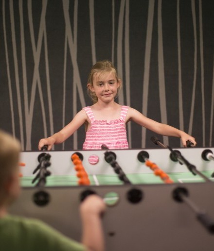 Families enjoy the table football table at the Jagdhaus Wiese family hotel in the Sauerland