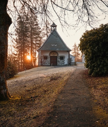 The Hubertus Chapel in Jagdhaus in the winter sunrise.