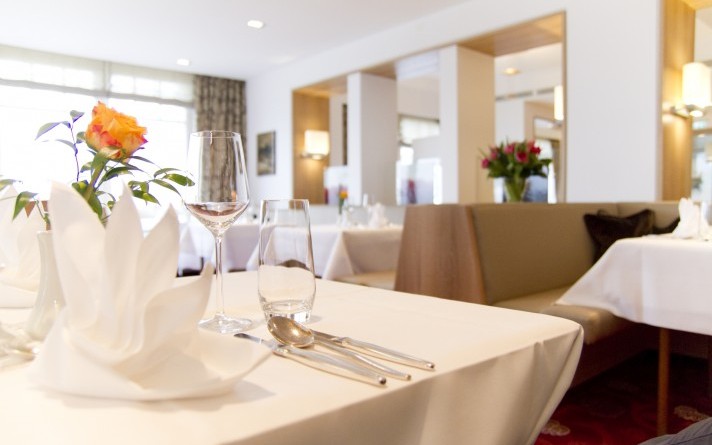 Festively laid table in the park restaurant at the Hotel Jagdhaus Wiese in the Sauerland
