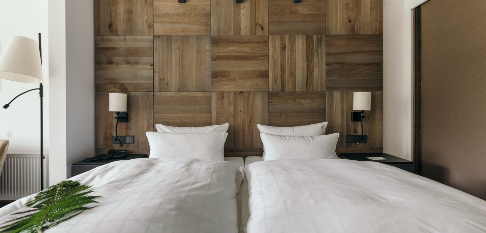 Slaapgedeelte van een tweepersoonskamer Comfort in Hotel Jagdhaus Wiese in het Sauerland