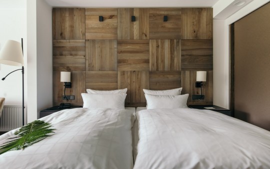 Sleeping area of a Comfort double room at the Hotel Jagdhaus Wiese in the Sauerland
