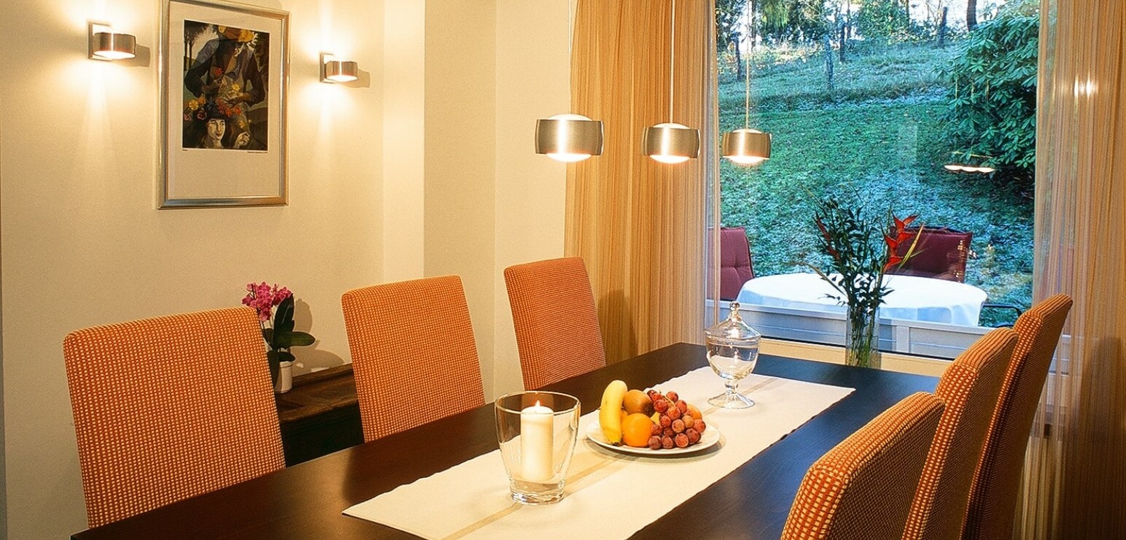 Dining room with terrace of the ‘Swallow's Nest’ holiday flat in the Schneisberghaus belonging to the Hotel Jagdhaus Wiese in the Sauerland region